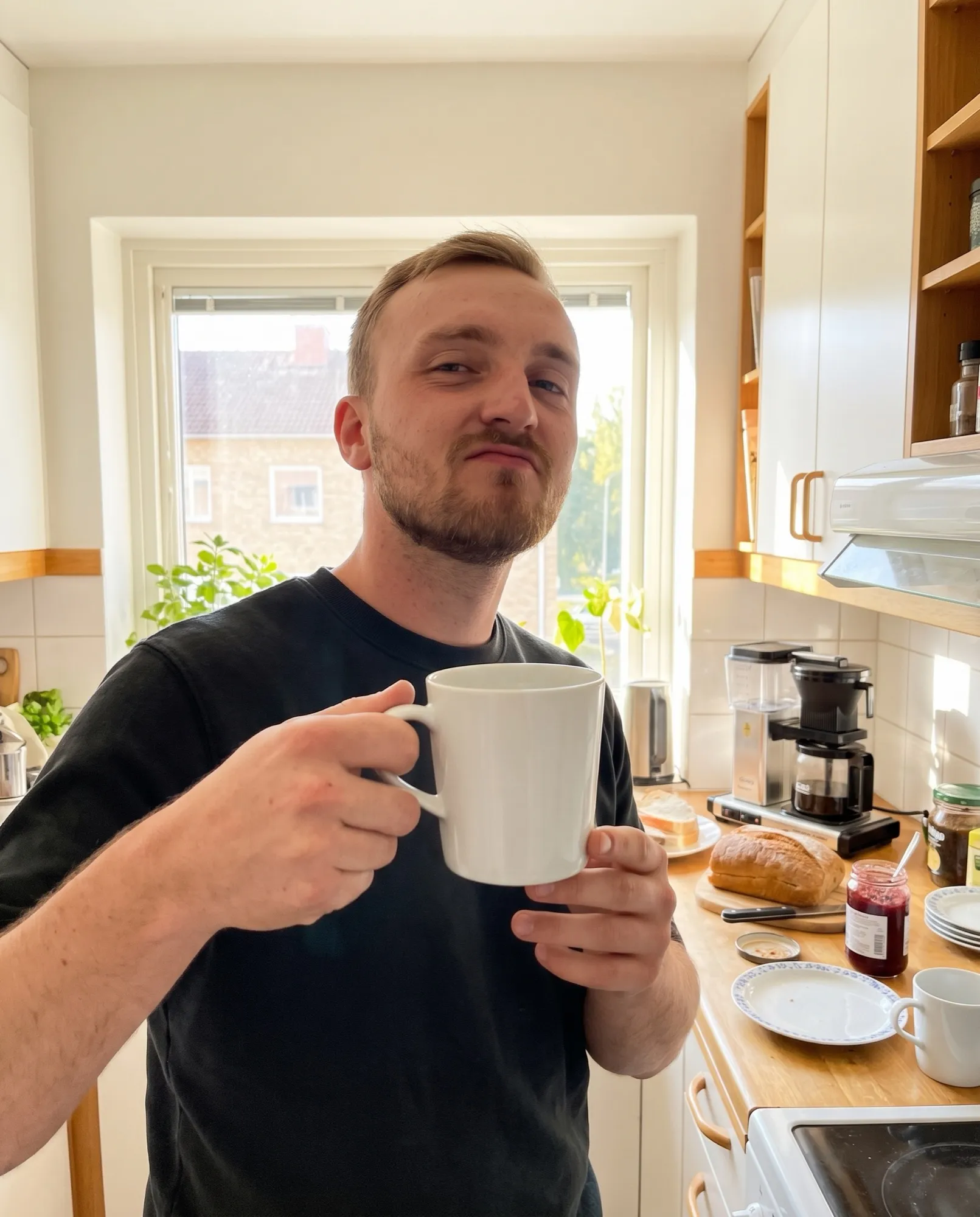 Världens bästa pappa dricker kaffe ur en mugg